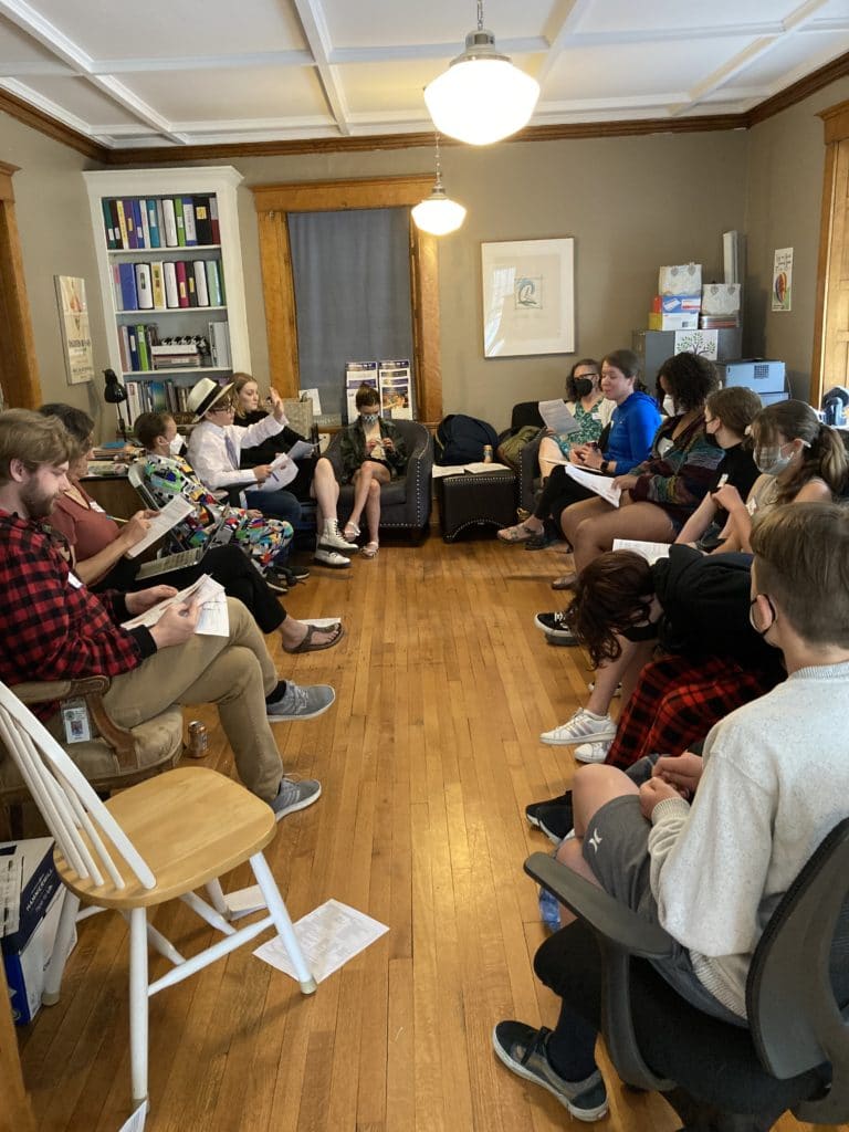 a group of people sitting in a room