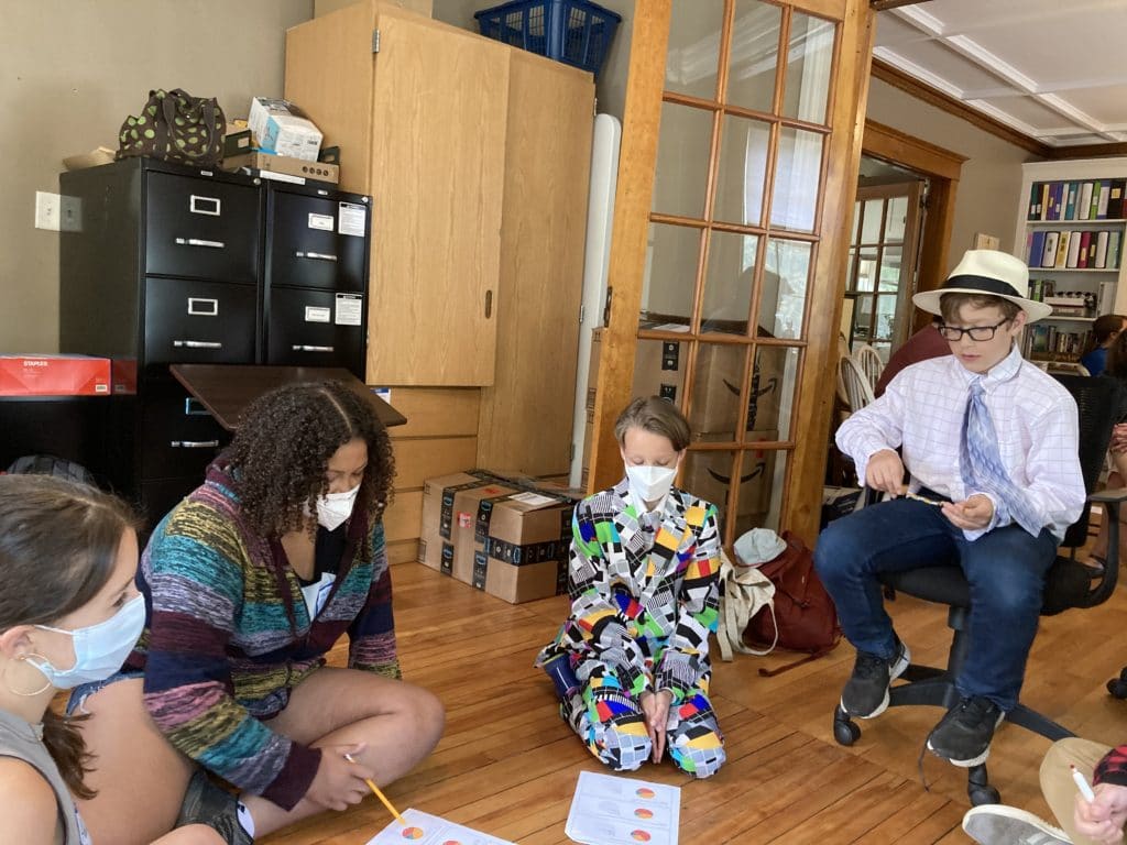 a group of people sitting in a room