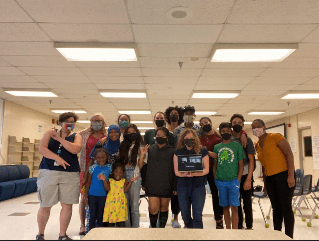 a group of people posing for a photo