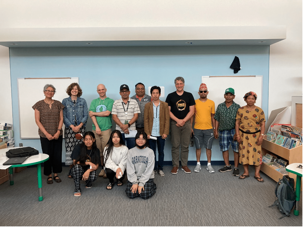 a group of people posing for a photo