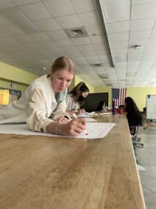 a person sitting at a desk