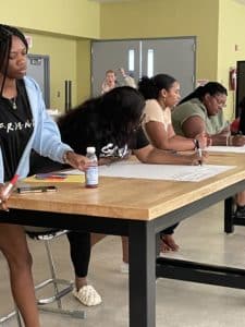 a group of people sitting at a table