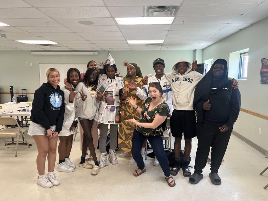 a group of people posing for a photo